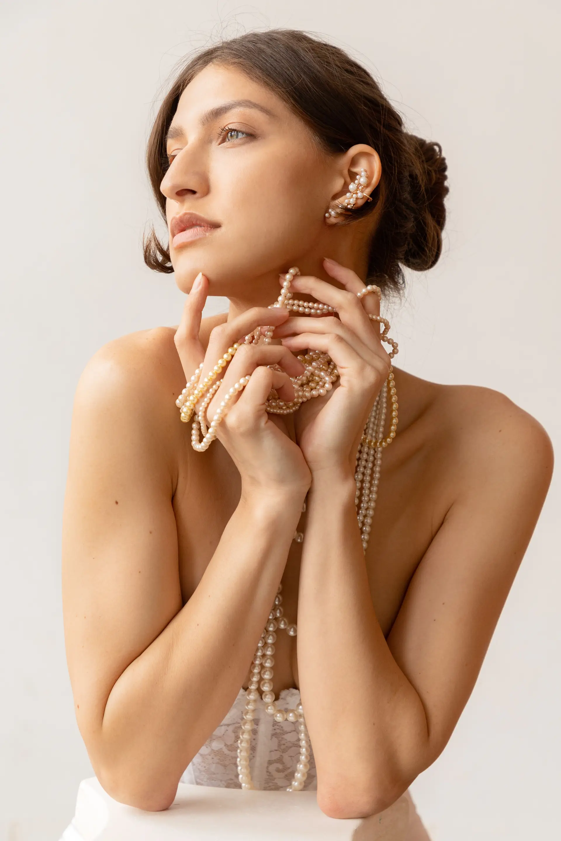 Woman wearing bespoke pearl set