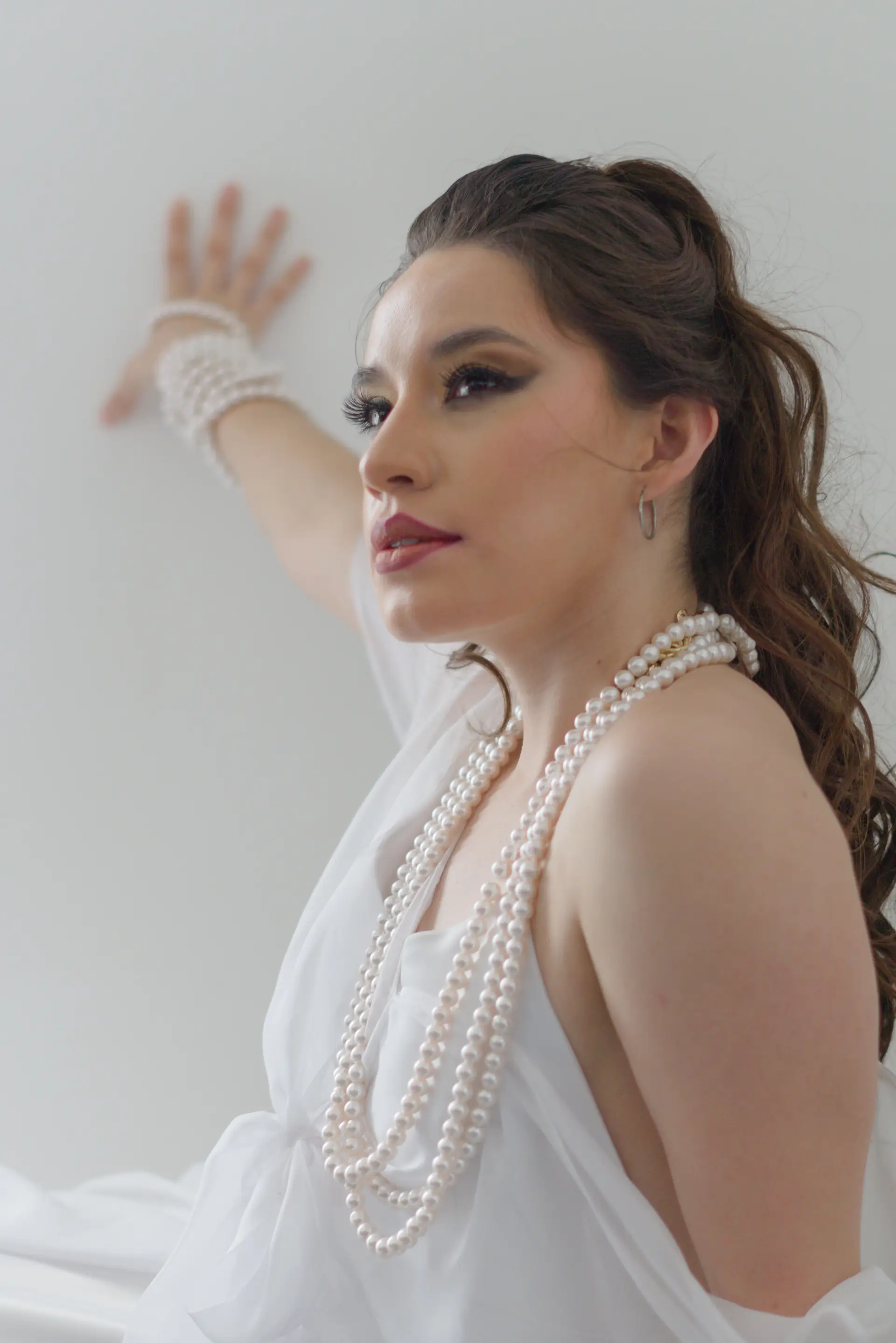 Bride wearing elegant pearl necklace