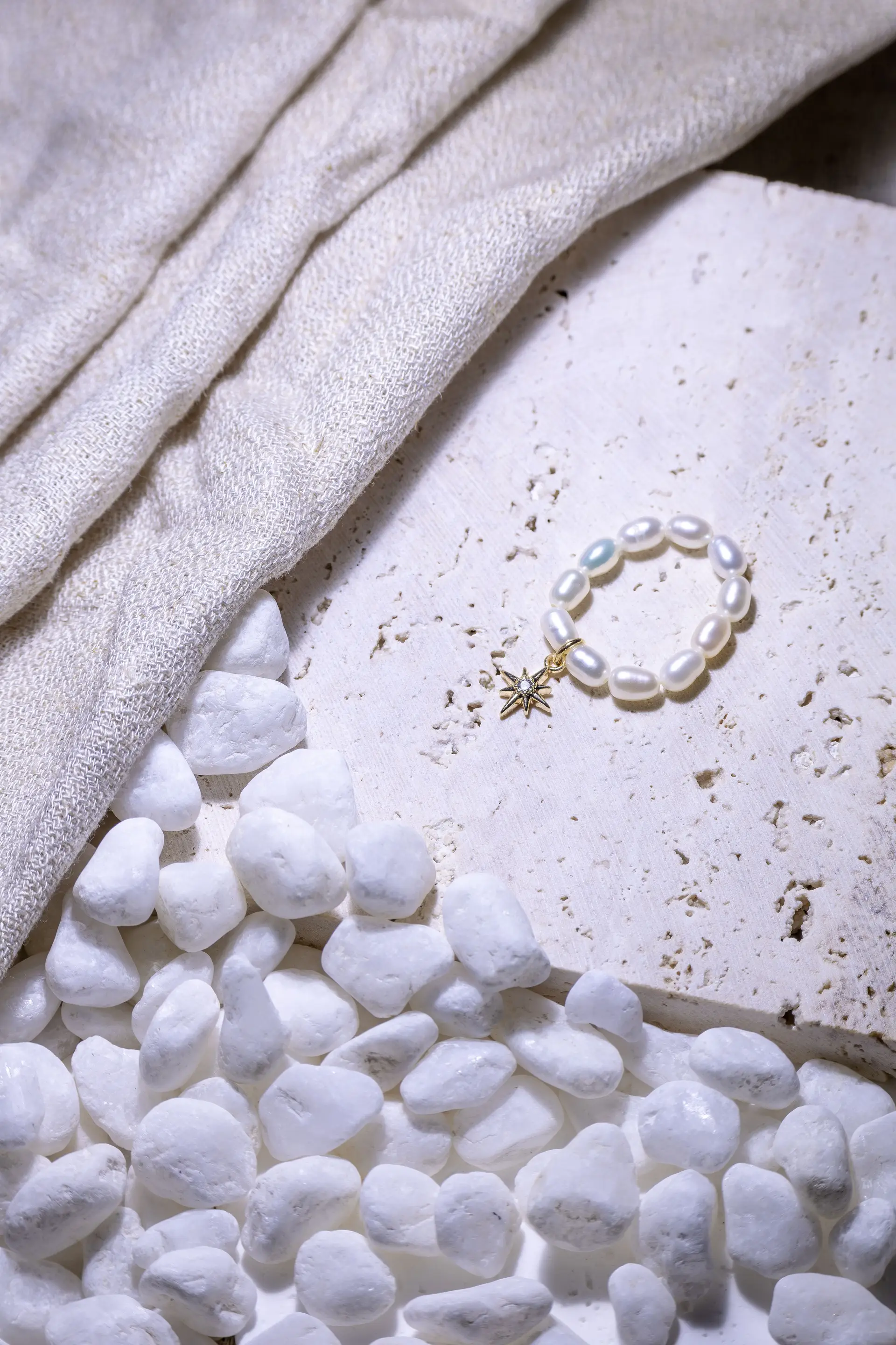 Pearl bracelet on stone